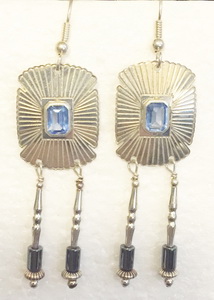 sterling silver with 6x4 em cut blue cz 